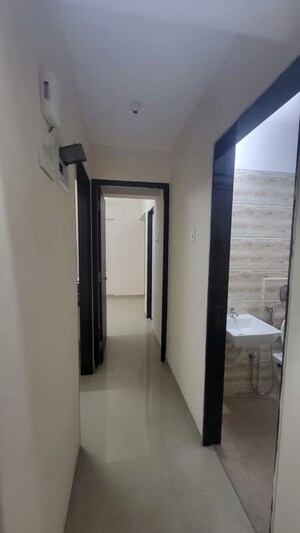 Building Lobby in 1 BHK Apartment at Provident Palmvista, Daighar Gaon – for Rent