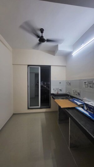 Kitchen in 1 BHK Apartment at Provident Palmvista, Daighar Gaon – for Rent