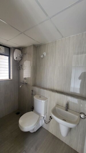 Bathroom in 1 BHK Apartment at Runwal Gardens, Dombivli East – for Rent