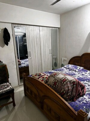 Bedroom in 2 BHK Apartment at Runwal Garden City, Balkum Pada – for Rent