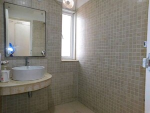 Bathroom in 3 BHK Apartment at Jaypee Green Pavillion Heights, Sector 128 – for Rent