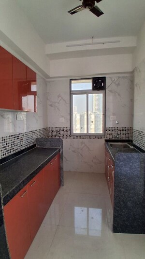 Kitchen in 2 BHK Apartment at DGS Sheetal Tapovan, Malad East – for Rent