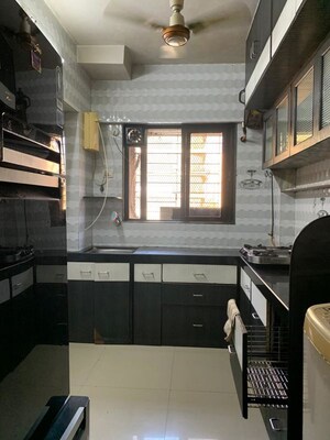 Kitchen in 1 BHK Apartment at New Nikita Apartments, Borivali West – for Rent