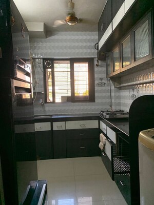 Kitchen in 1 BHK Apartment at New Nikita Apartments, Borivali West – for Rent
