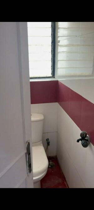 Bathroom in 1 BHK Apartment at Oakland Park, Andheri West – for Sale
