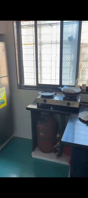 Kitchen in 1 BHK Apartment at Oakland Park, Andheri West – for Sale