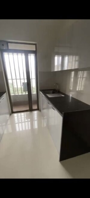 Kitchen in 2 BHK Apartment at Kalpataru Paramount B, Kapur Bawdi – for Sale