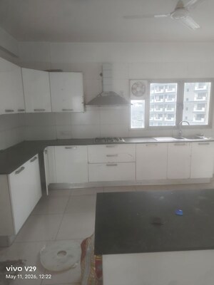 Kitchen in 3.5 BHK Apartment at Tata Raheja Raisina Residency, Sector 59 – for Sale
