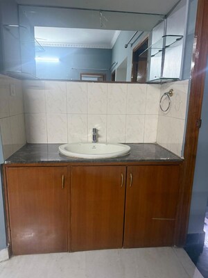 Bathroom in 3 BHK Apartment at Defence Colony – for Rent