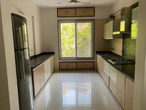 Kitchen in 3 BHK Apartment at Nyati Wind Chimes, Undri – for Rent
