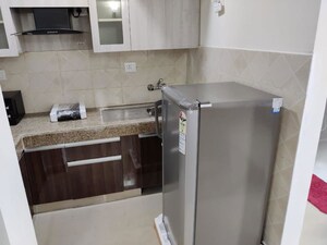 Kitchen in 1 RK Apartment at Logix Blossom Zest, Sector 143 – for Rent