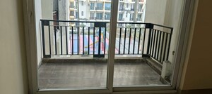 Balcony in 2 BHK Apartment at Logix Blossom Zest, Sector 143 – for Rent