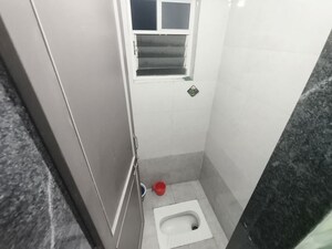 Bathroom in 1 BHK Apartment at Dedge 10 Elite, Dattawadi – for Rent