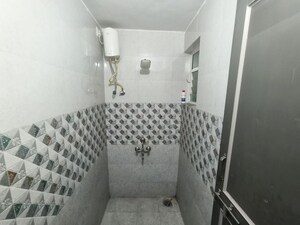 Bathroom in 1 BHK Apartment at Dedge 10 Elite, Dattawadi – for Rent