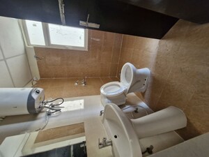 Bathroom in 3.5 BHK Apartment at Amrapali Hanging Gardens, Sector 107 – for Sale