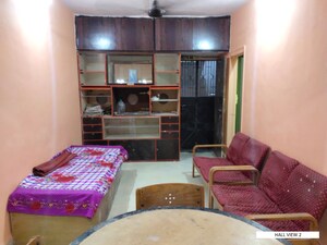 Living Room in 2 BHK Apartment at Vile Parle West – for Rent