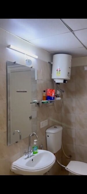 Bathroom in 4 BHK Apartment at Gaur Atulyam, Omicron I Greater Noida – for Rent