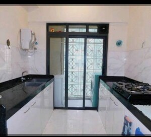 Kitchen in 4 BHK Apartment at Lodha Sterling, Kolshet Road – for Sale