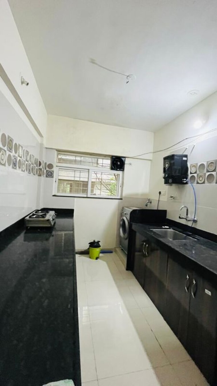 Kitchen, manohar-paradise 2 Bedroom 700 Sq.Ft. Apartment In Baner Pune 10346791