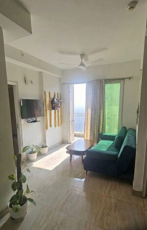 Living Room in 2.5 BHK Apartment at Mahaluxmi Migsun Ultimo, Omicron Iii Greater Noida – for Rent