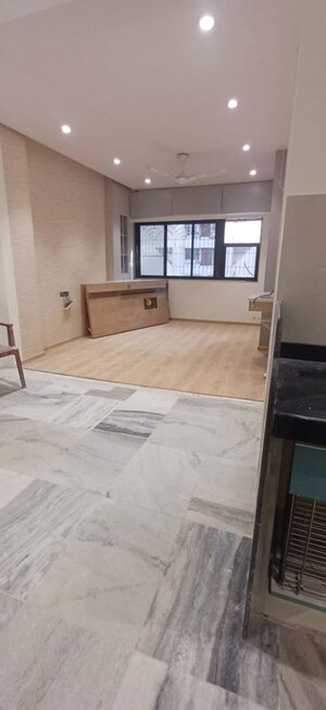 Living Room in 1 BHK Apartment at Andheri West – for Sale
