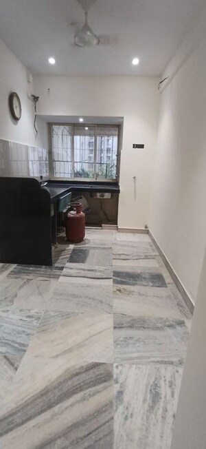 Living Room in 1 BHK Apartment at Andheri West – for Sale