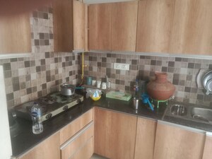 Kitchen in 1 RK Apartment at Prateek Grand Carnesia, Siddharth Vihar – for Rent