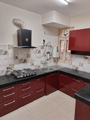 Kitchen in 4 BHK Apartment at Tarika CGHS, Sector 43 – for Rent