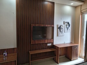 Living Room in Studio Apartment at Gaur City Center, Sector 4 Greater Noida – for Rent