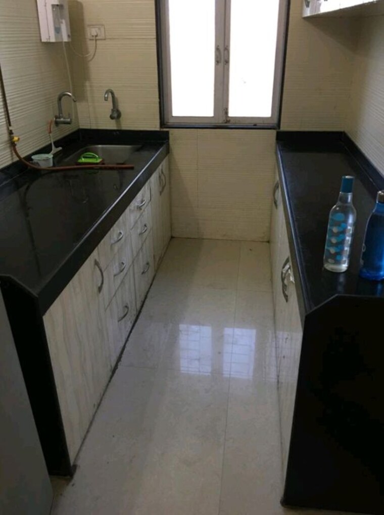 Kitchen, raymond-ten-x-habitat 2 Bedroom 672 Sq.Ft. Apartment In Pokhran Road No Two Thane 10366711