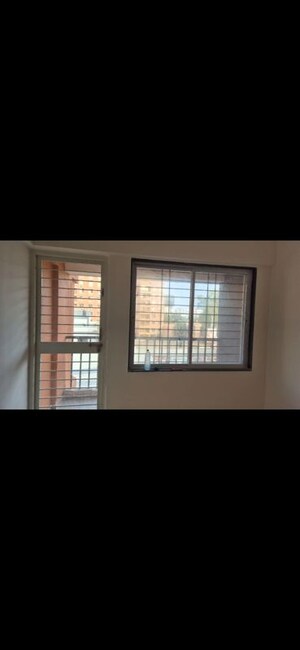 Room in 2 BHK Apartment at Kokane Square One, Rahatani – for Rent