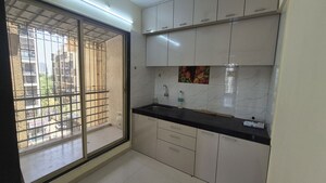 Kitchen in 2 BHK Apartment at Platinum Om Sai Shrushti, Ulwe – for Rent