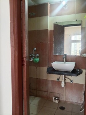 Bathroom in 2.5 BHK Apartment at Mahagun Mywoods, Sector 16c Greater Noida – for Rent
