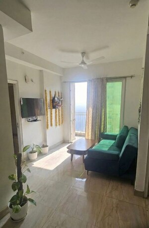 Living Room in 2 BHK Apartment at Mahaluxmi Migsun Ultimo, Omicron Iii Greater Noida – for Rent