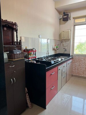 Kitchen in 2 BHK Apartment at Rustomjee Athena, Majiwada – for Rent
