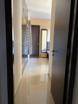 Building Lobby in 2 BHK Apartment at Rustomjee Athena, Majiwada – for Rent