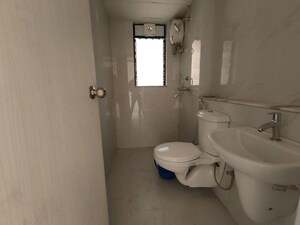 Bathroom in 3 BHK Apartment at Runwal Gardens North Avenue, Dombivli East – for Rent