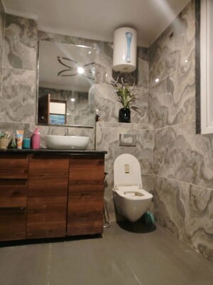 Bathroom in 4 BHK Apartment at Ansal API Versalia, Sector 67a – for Rent