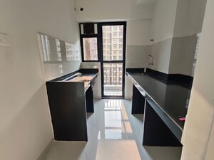 Kitchen in 1.5 BHK Apartment at Runwal Gardens Phase 4, Dombivli East – for Rent