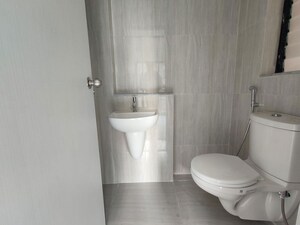 Bathroom in 1.5 BHK Apartment at Runwal Gardens Phase 4, Dombivli East – for Rent