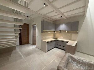 Living Room in Studio Apartment at M3M Corner Walk, Sector 74 – for Rent