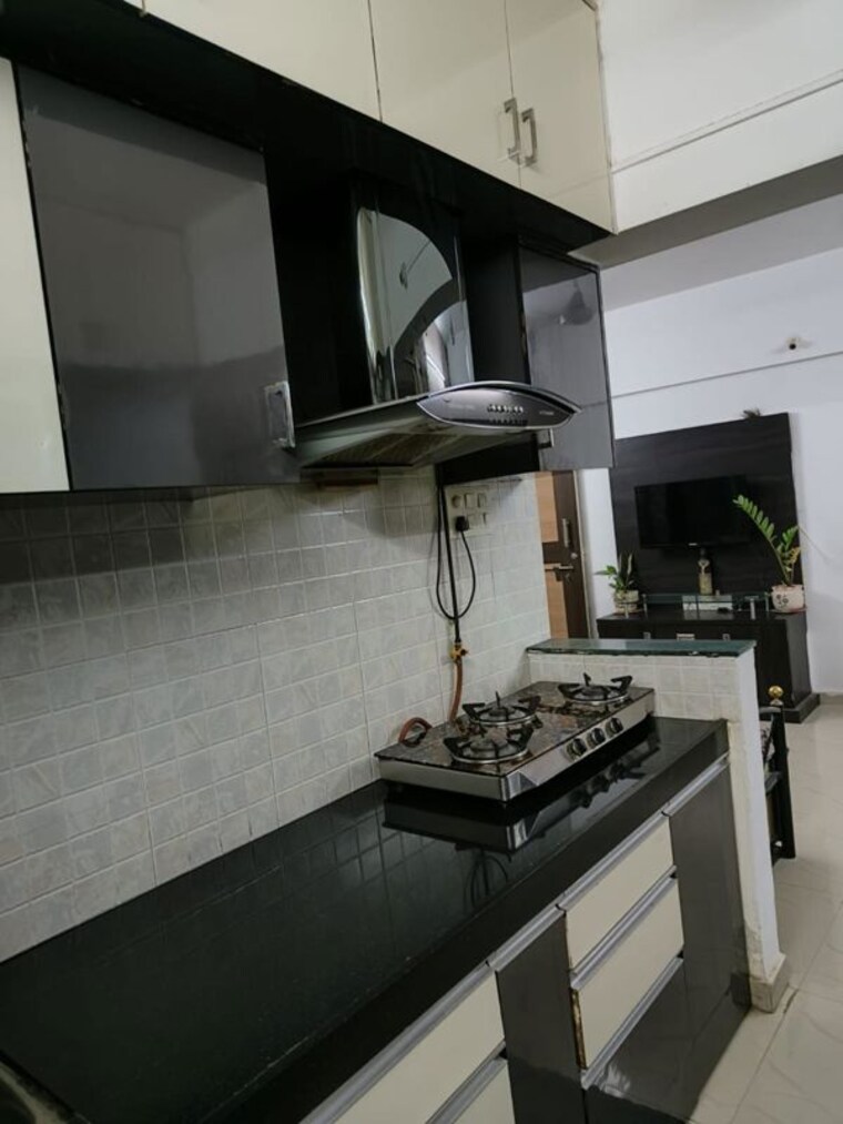 Kitchen, essen-shonest-towers 1 Bedroom 478 Sq.Ft. Apartment In Wakad Pune 10366970