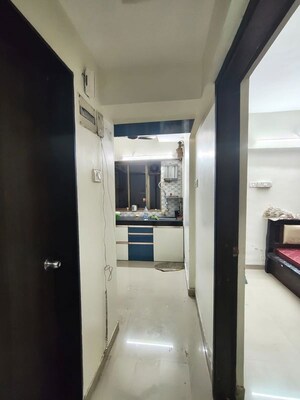 Building Lobby in 1 BHK Apartment at Runwal Garden City, Balkum Pada – for Rent