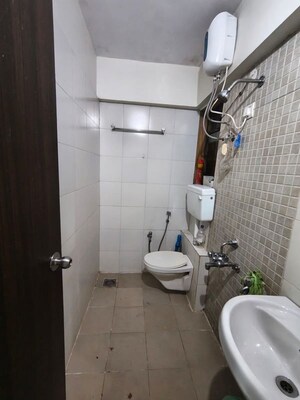Bathroom in 1 BHK Apartment at Runwal Garden City, Balkum Pada – for Rent