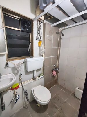 Bathroom in 1 BHK Apartment at Runwal Garden City, Balkum Pada – for Rent