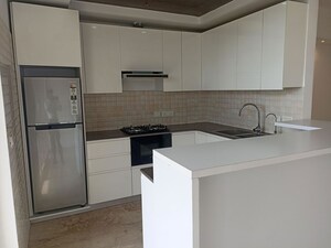 Kitchen in 3 BHK Apartment at Supertech Supernova Nova Residences, Sector 94 – for Rent