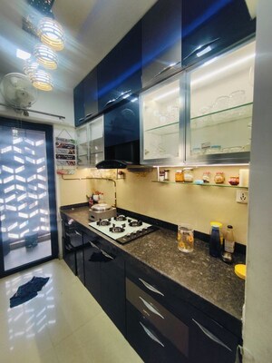 Kitchen in 2 BHK Apartment at Lodha Downtown, Dombivli East – for Rent