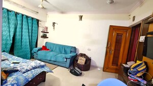 Living Room in 1 BHK Apartment at Onkar CHS, Goregaon East – for Rent