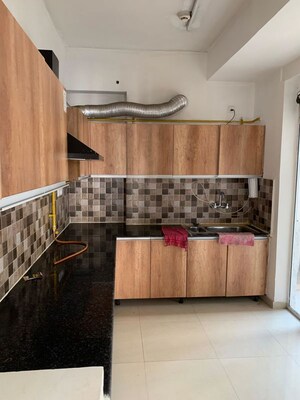 Kitchen in 2 BHK Apartment at Charms Solitaire Ghaziabad, Ahinsa Khand 2 – for Sale