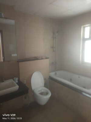 Bathroom in 4 BHK Apartment at Tata Raheja Raisina Residency, Sector 59 – for Rent